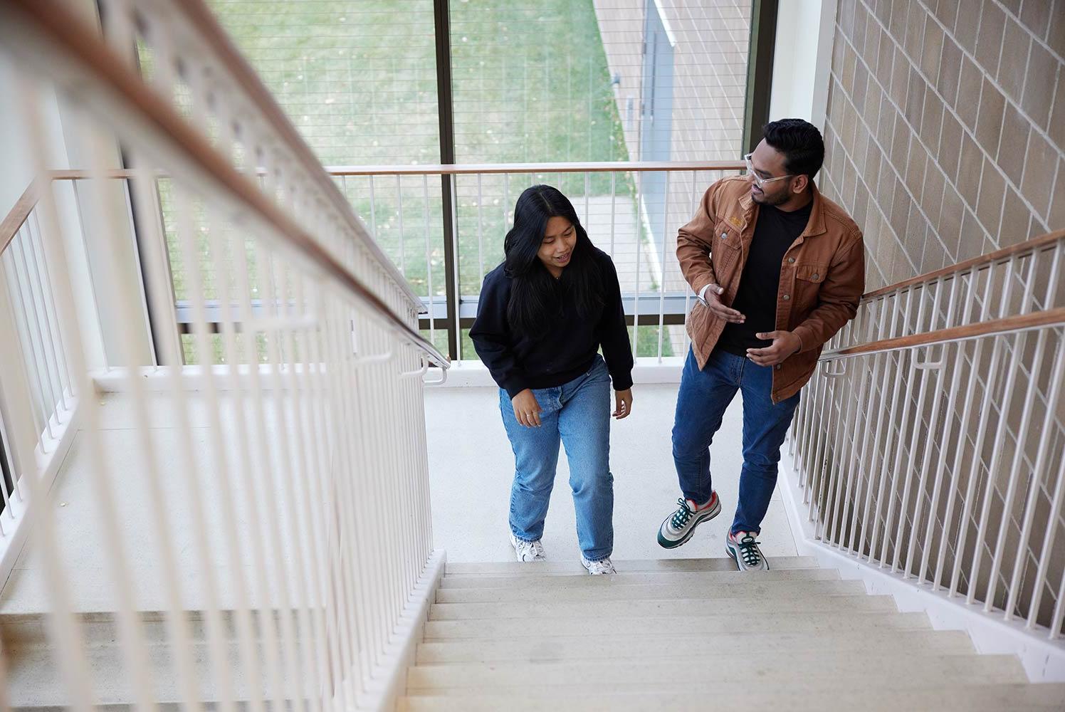 Photo of students walking up the stairs